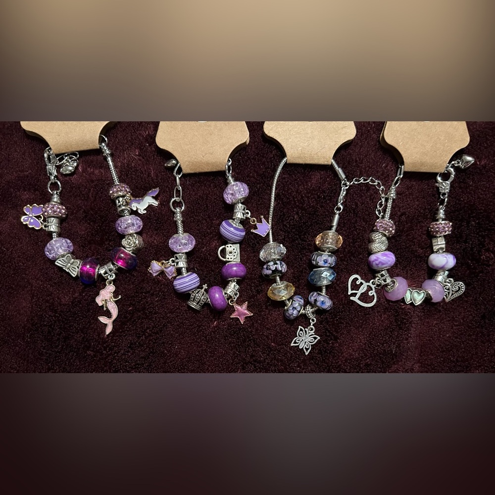 Charm bracelets. Multiple styles